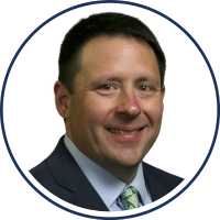 marc-bushallow-headshot-dark-blue-outline